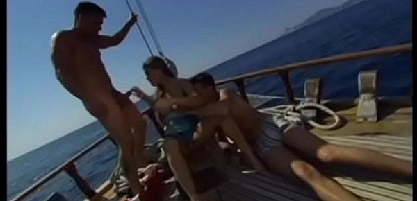  Smoking hot brunette slut Rita Faltoyano gets double penetrated on a yacht